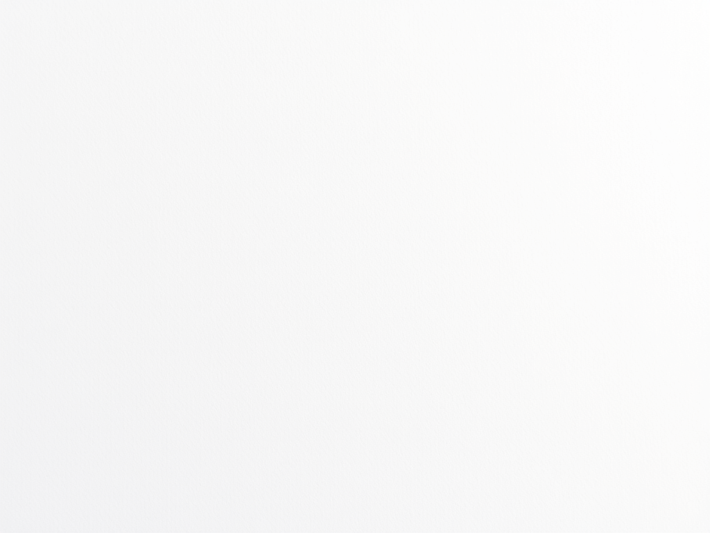 A modern office lobby with white marble floors, a reception desk, and gold light fixtures.